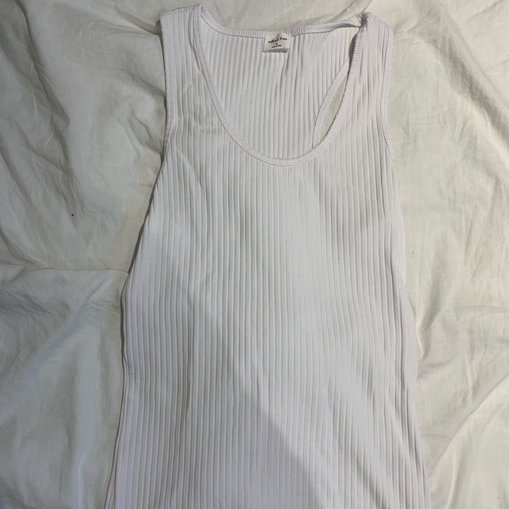 White racer back Wilfred Tank